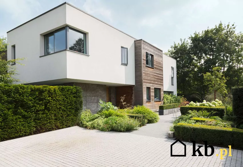 Grzejniki nie są już tak popularnym elementem grzewczym w nowoczesnych domach Modernistyczny dom jednorodzinny z płaskim dachem