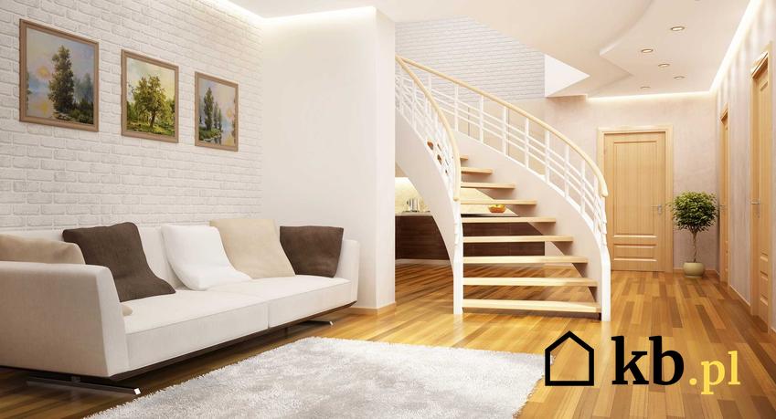 Białe nowoczesne schody w eleganckim salonie oraz inne polecane schody wewnętrzne do salonu i korytarza