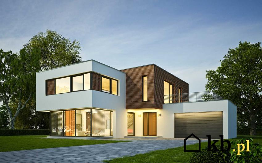 Płaski dach na nowoczesnym domu w modernistycznym stylu w kształcie sześcianów o jasnobrązowej elewacji